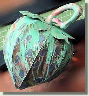 copper strawberry sculpture