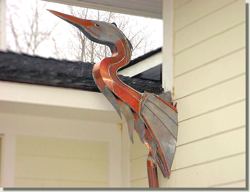 copper heron sculpture